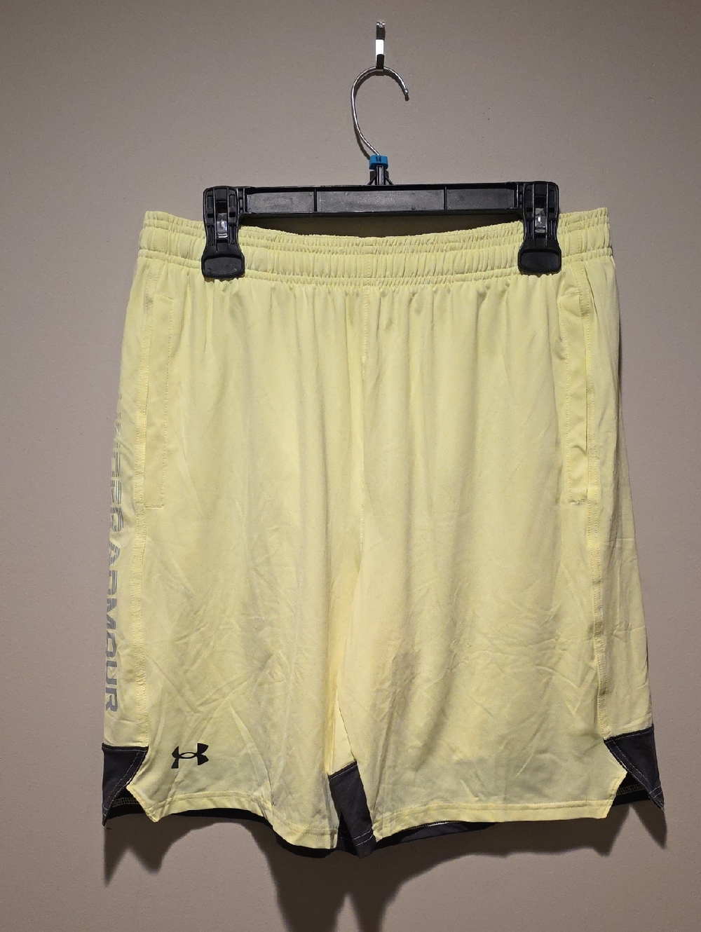 Under Armour Pale Yellow Athletic Shorts with Gray Accents